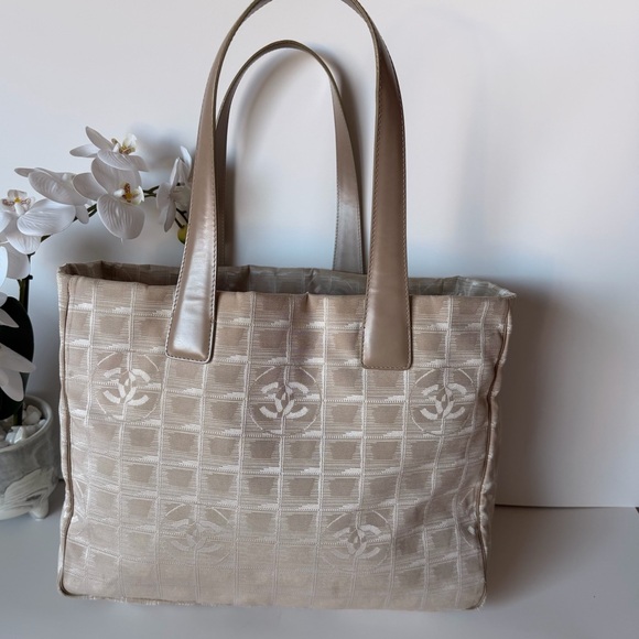 CHANEL Handbags - Chanel Travel Line Tote Beige CC Jacquard  very good condition pre loved 💕